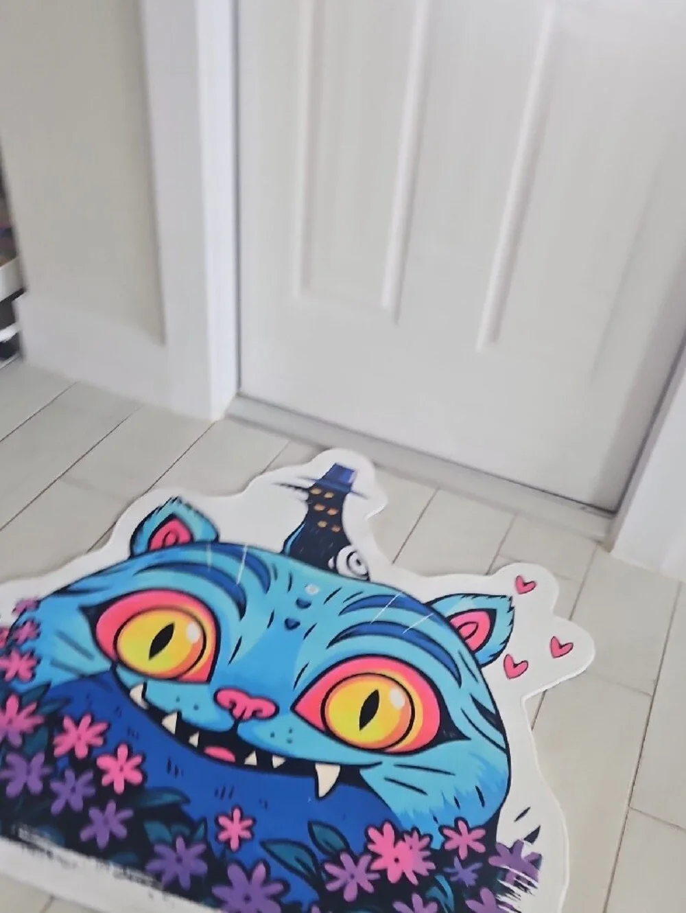 Blue Cheshire Cat Graphic Mat with Yellow Eyes